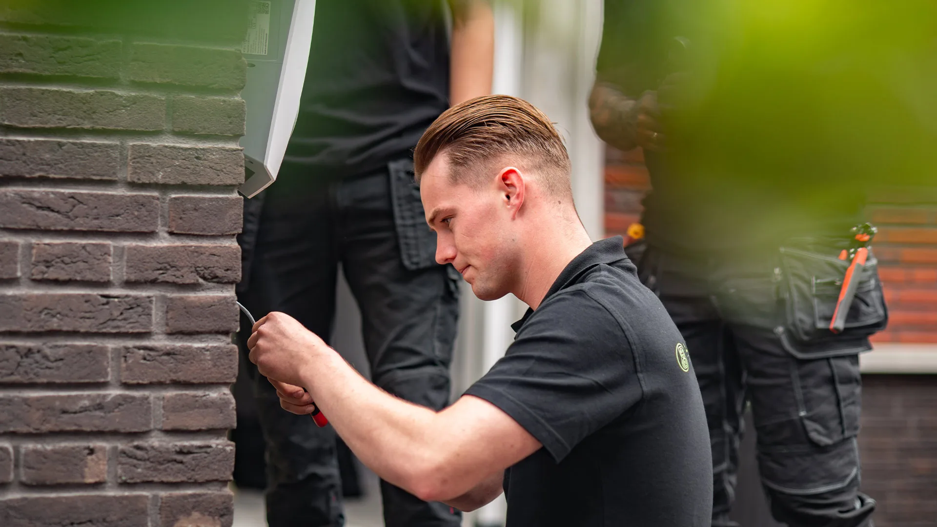 Installer commissioning a charger on-site